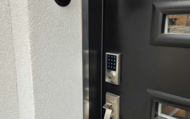 Smart lock and smart doorbell replacement by IQhome handyman in a Toronto home